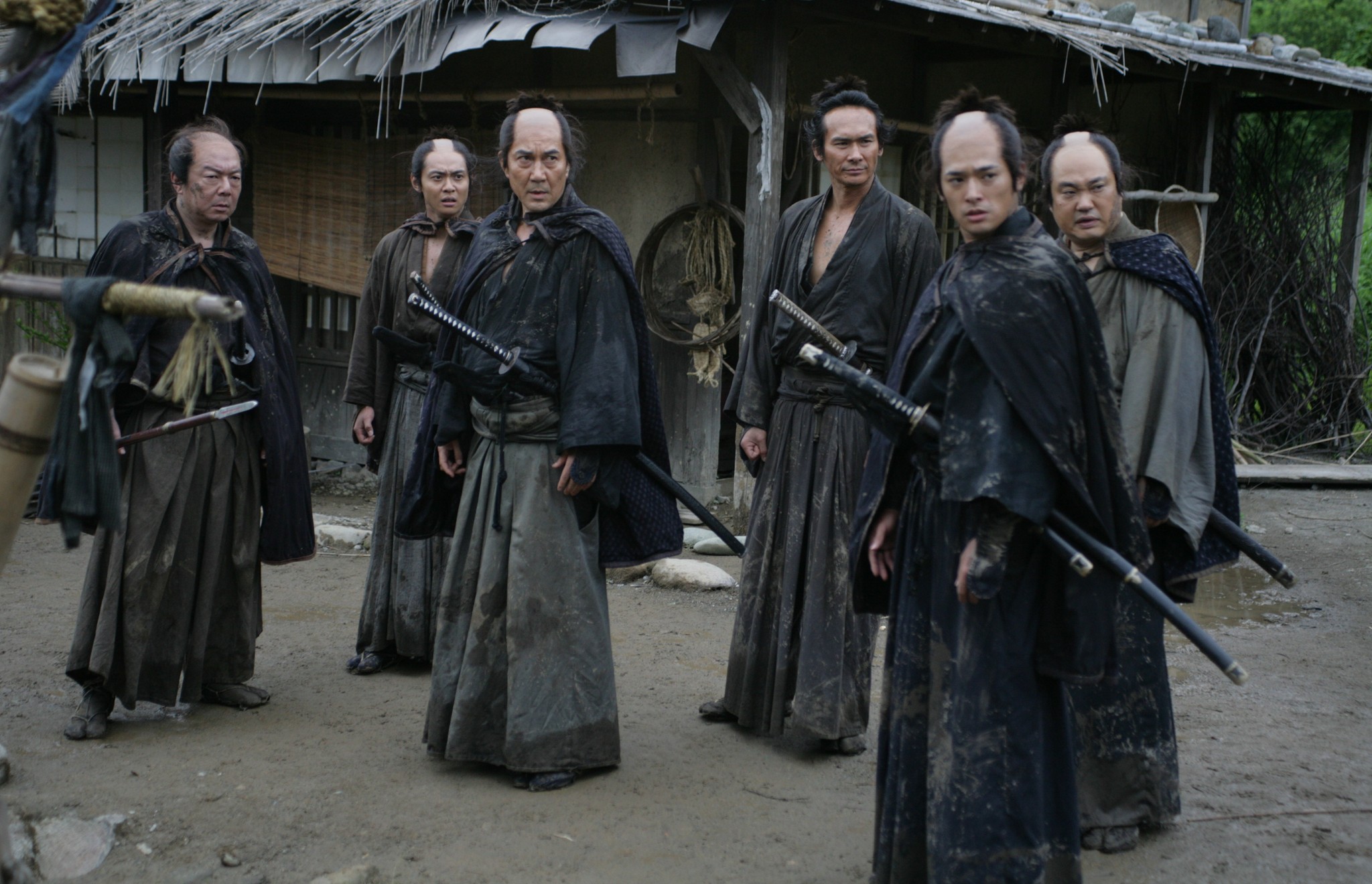 The Shogun's team sizes up the ragged thugs sent out to kill them in 13 Assassins.